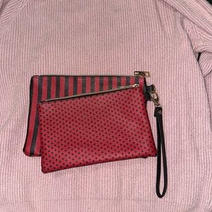 Red and Black wristlet, one for make up and the other one for money and cards